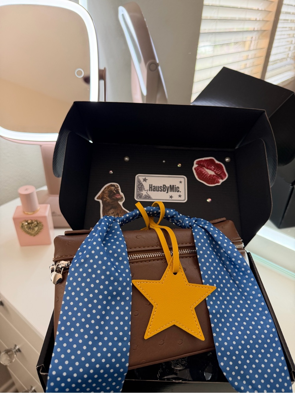Brown Crossbody Bag with Blue Polka Dot Scarf and Yellow Star Charm